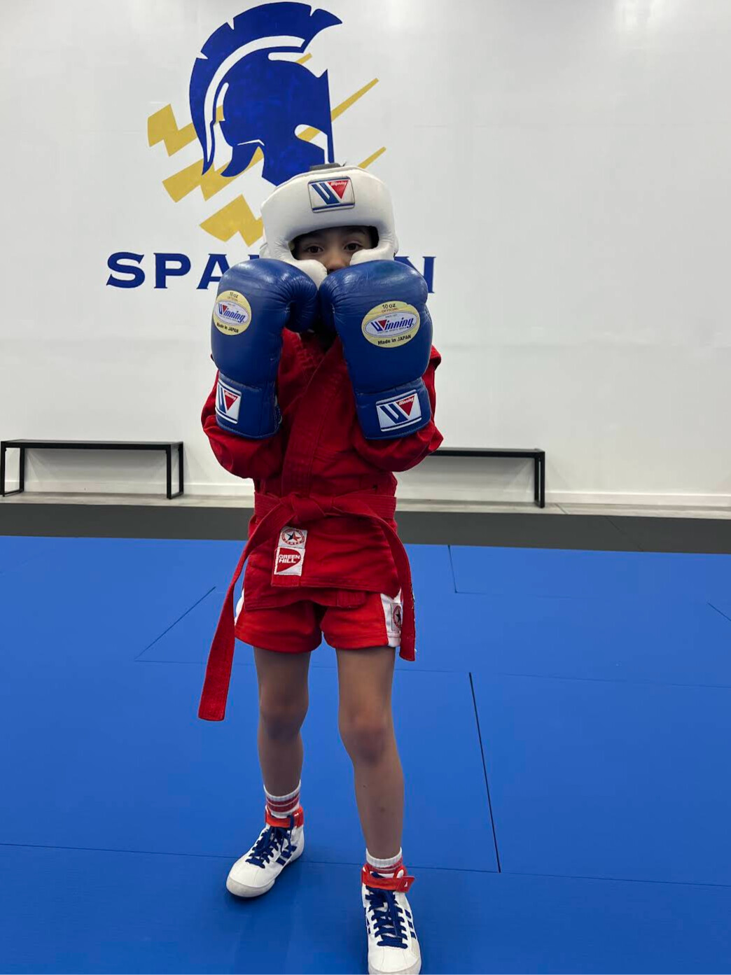 Young students in a kids combat sports class at Spartan Combat Sports